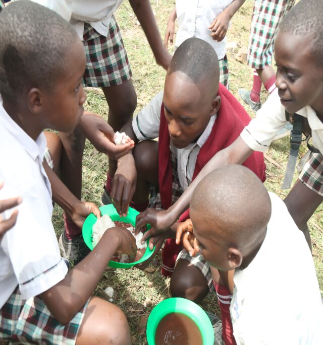 Children sharing a school meal